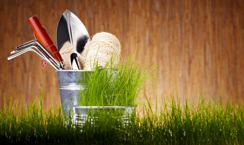 Professional garden maintenance team working in Ealing